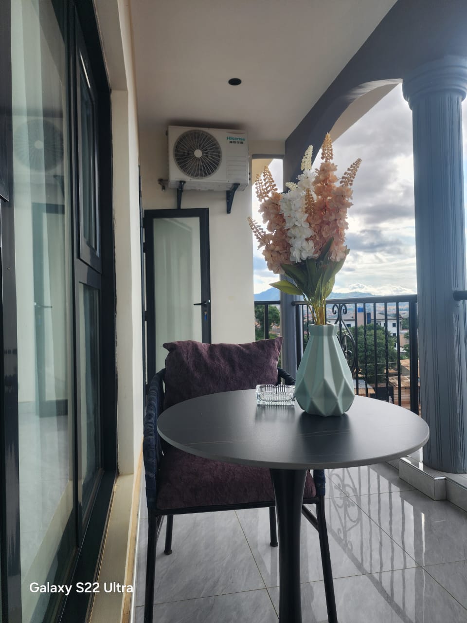 Private balcony overlooking the hills of Yaoundé