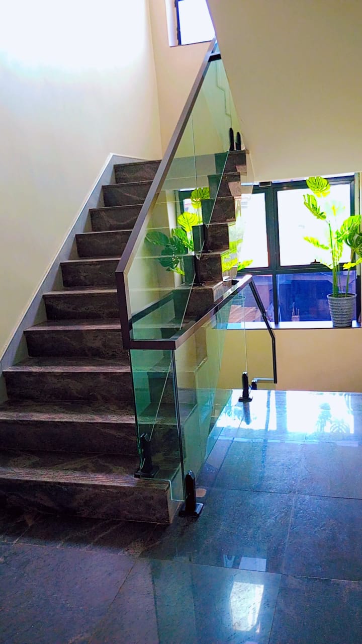 Marble staircase with glass balustrade