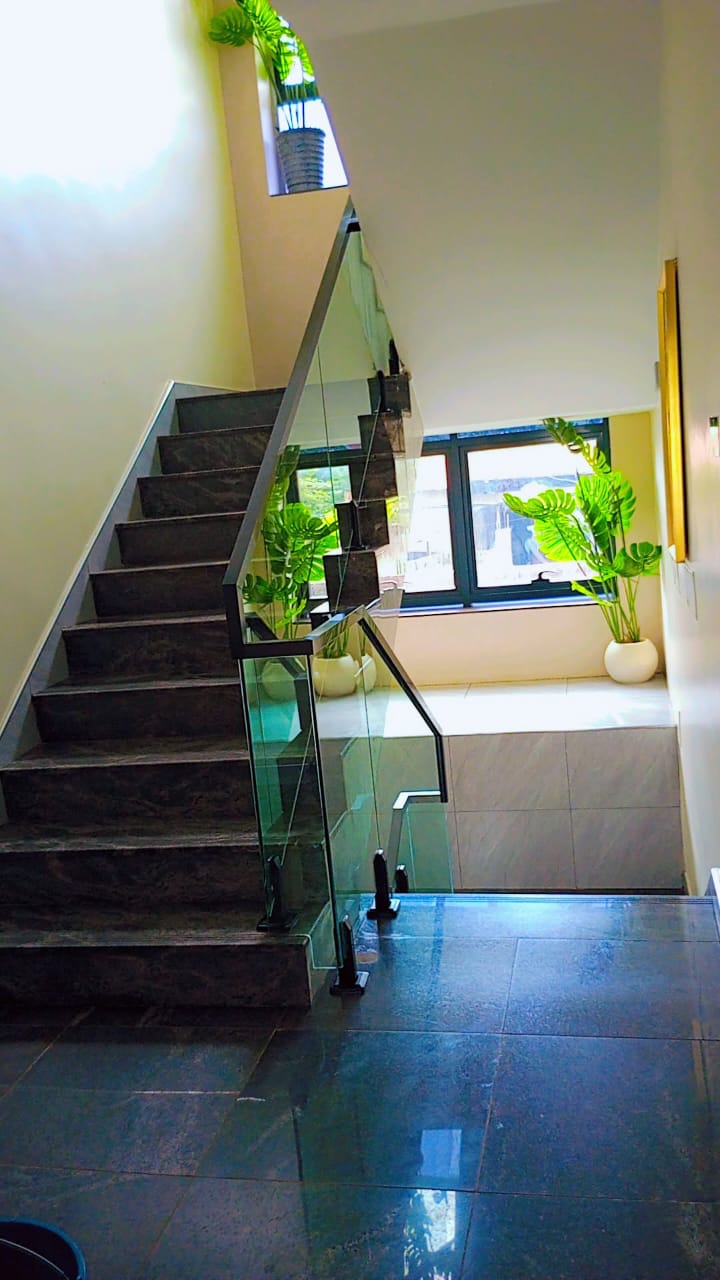 Bright staircase with greenery